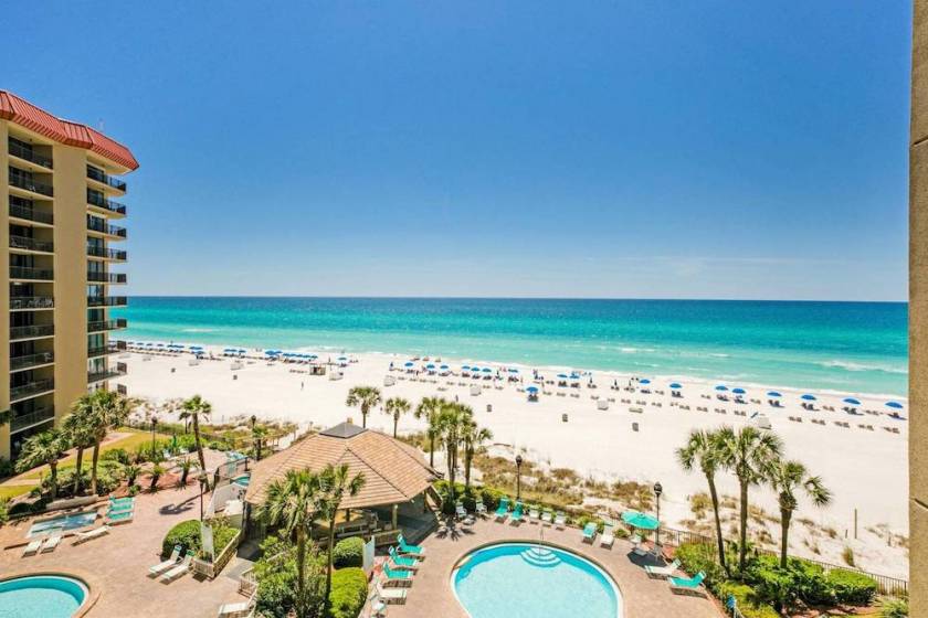 view from beach condo overlooking pool and the Gulf of Mexico